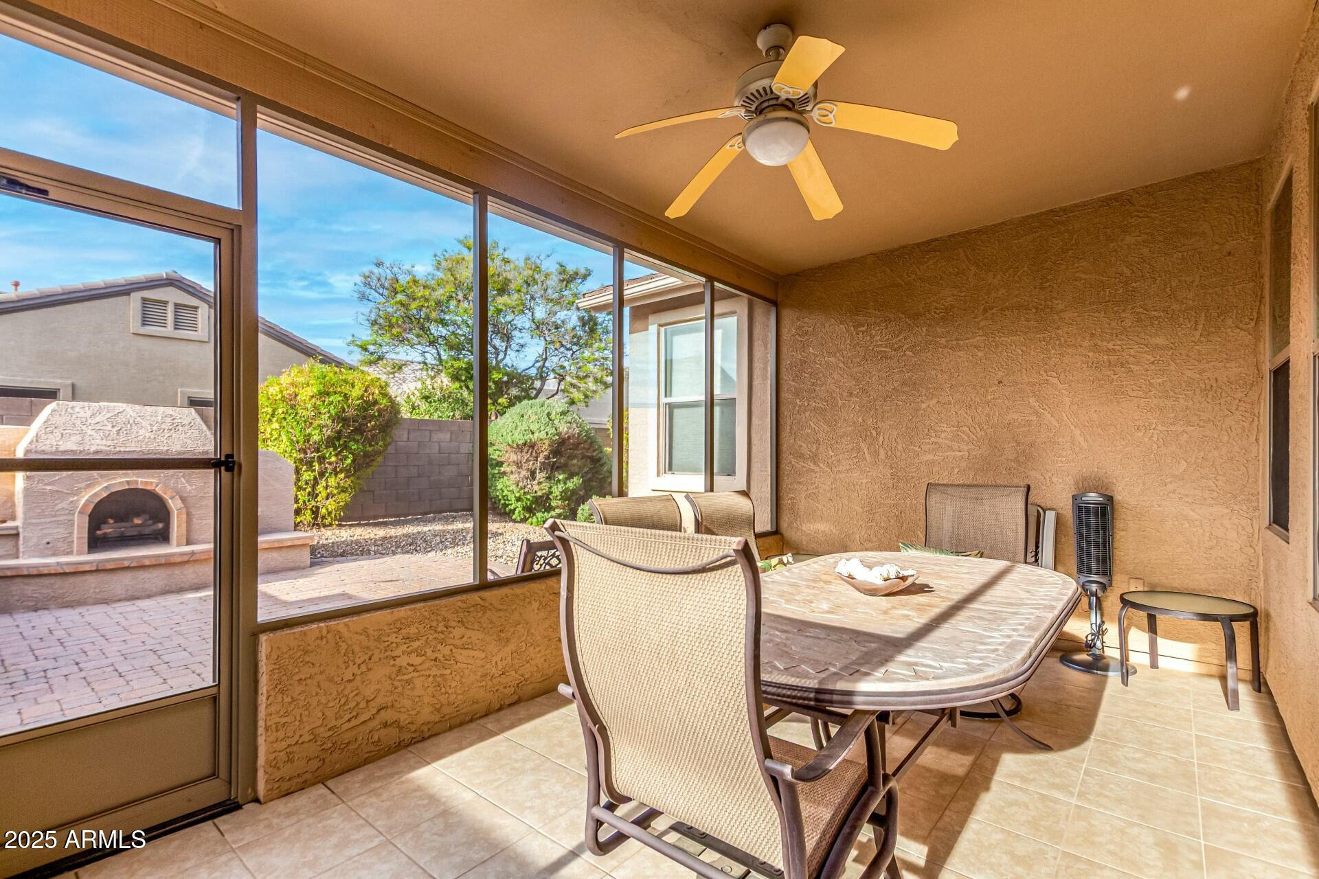 3038 West Trapanotto Road Phoenix, AZ 85086 - Photo 13 of 15 a view of a dining room with furniture window and outside view