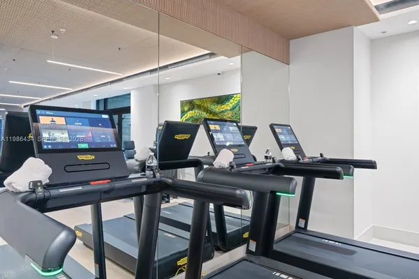 a view of a workspace with furniture