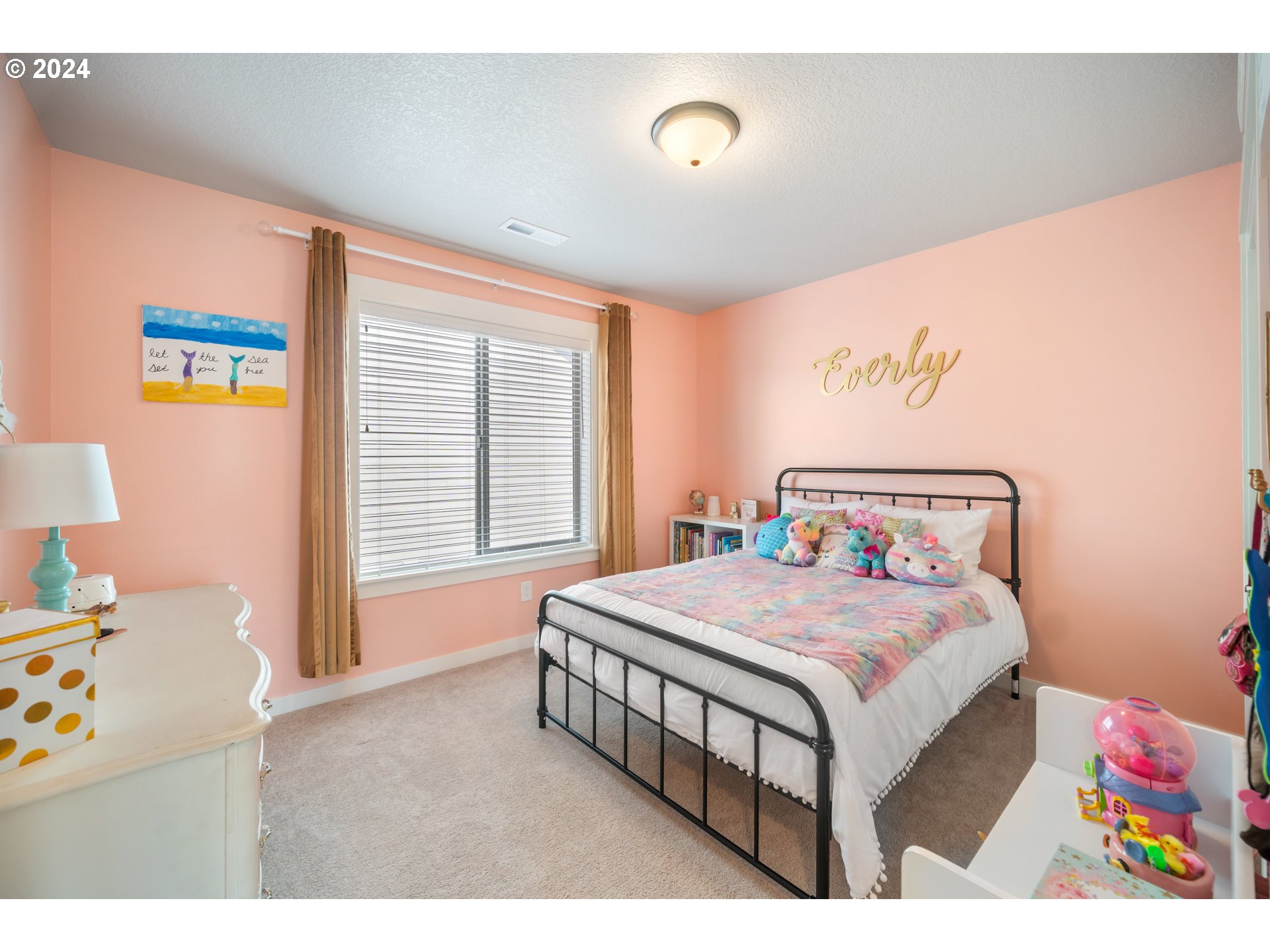 2408 South Eagle Ridge Drive Ridgefield, WA 98642 - Photo 23 of 32 a bedroom with a bed and a window