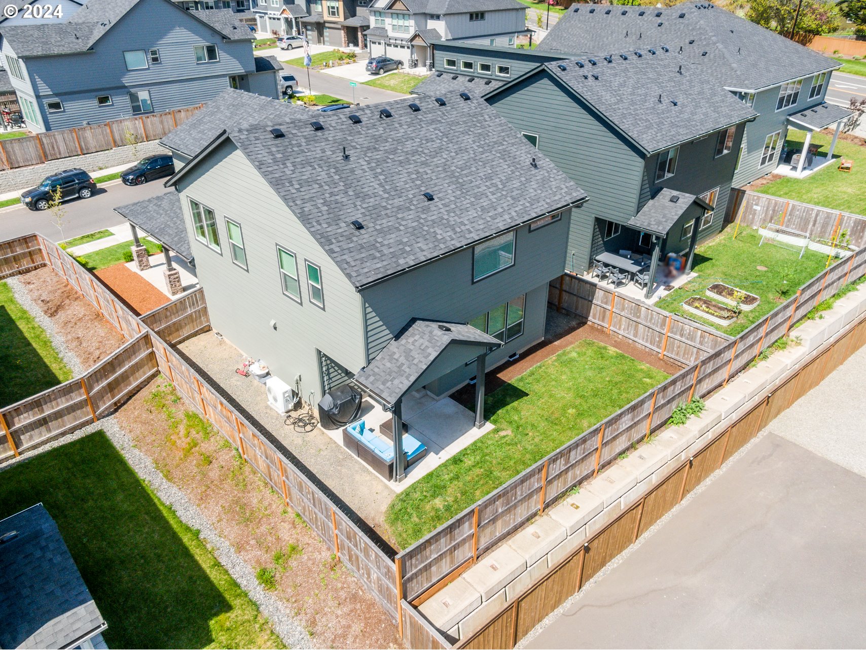 2408 South Eagle Ridge Drive Ridgefield, WA 98642 - Photo 30 of 32 an aerial view of a house with a garden and deck
