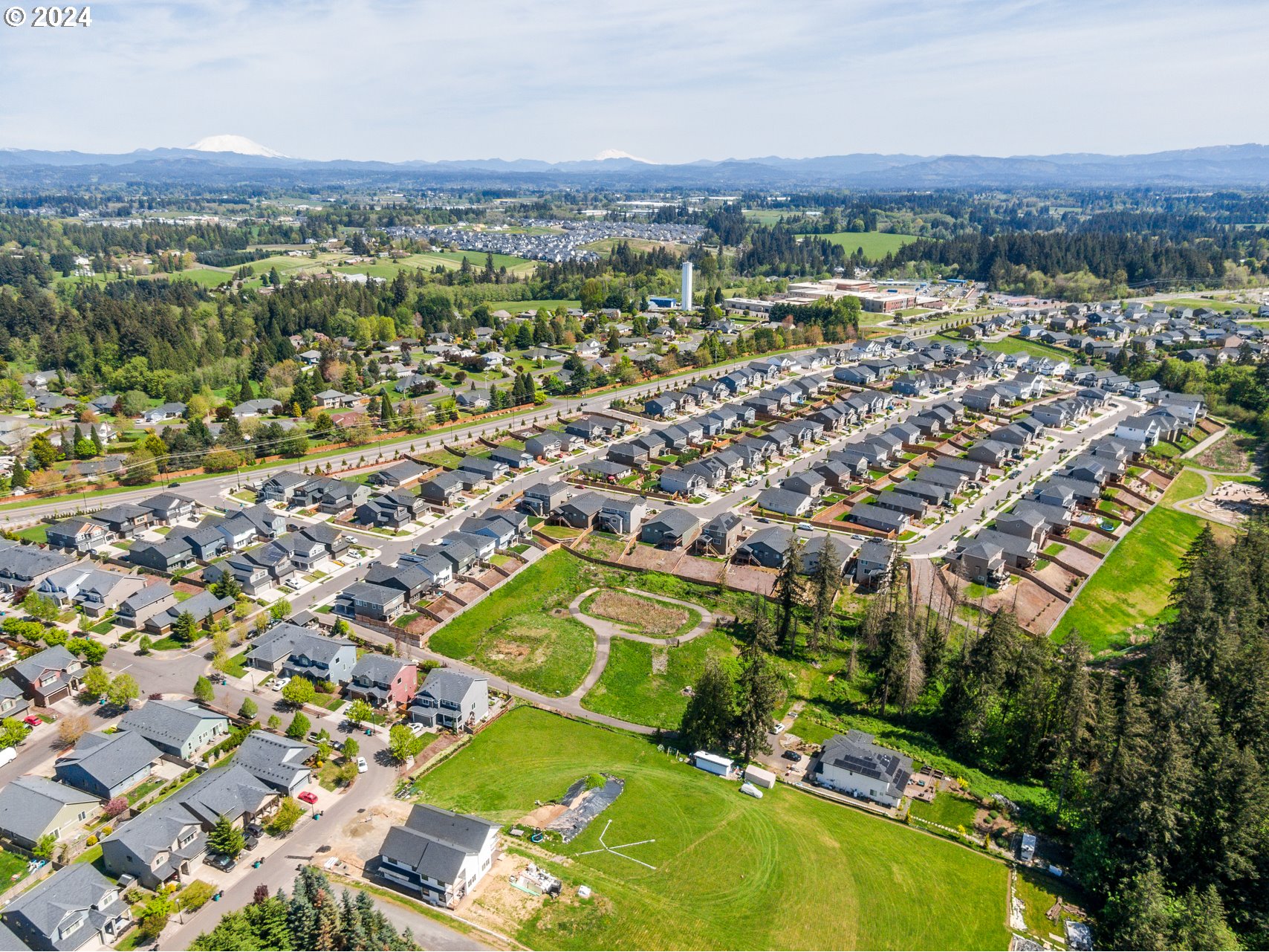 2408 South Eagle Ridge Drive Ridgefield, WA 98642 - Photo 31 of 32 an aerial view of residential houses with outdoor space and trees