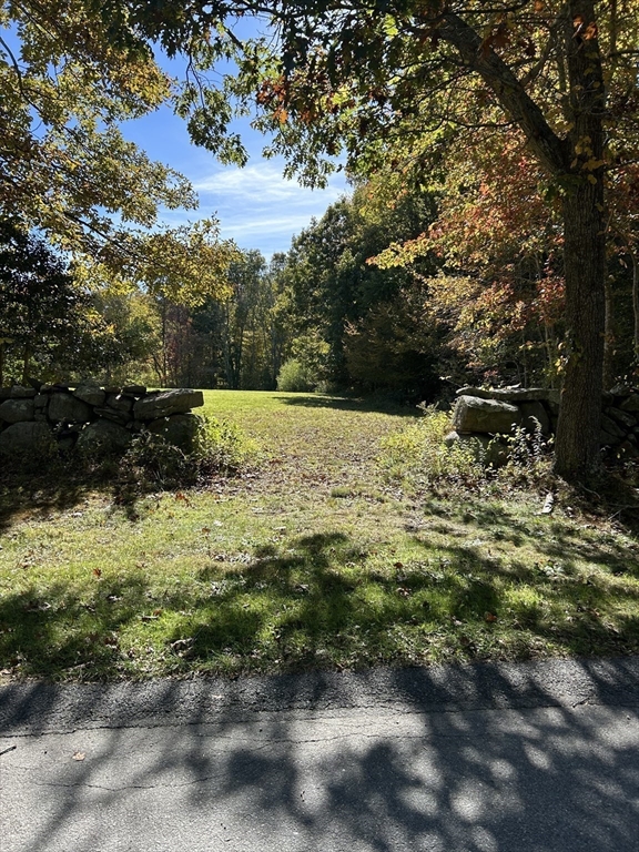 8 Strawberry Lane Westport, MA 02790 - Photo 4 of 7 a view of a large yard with lots of green space