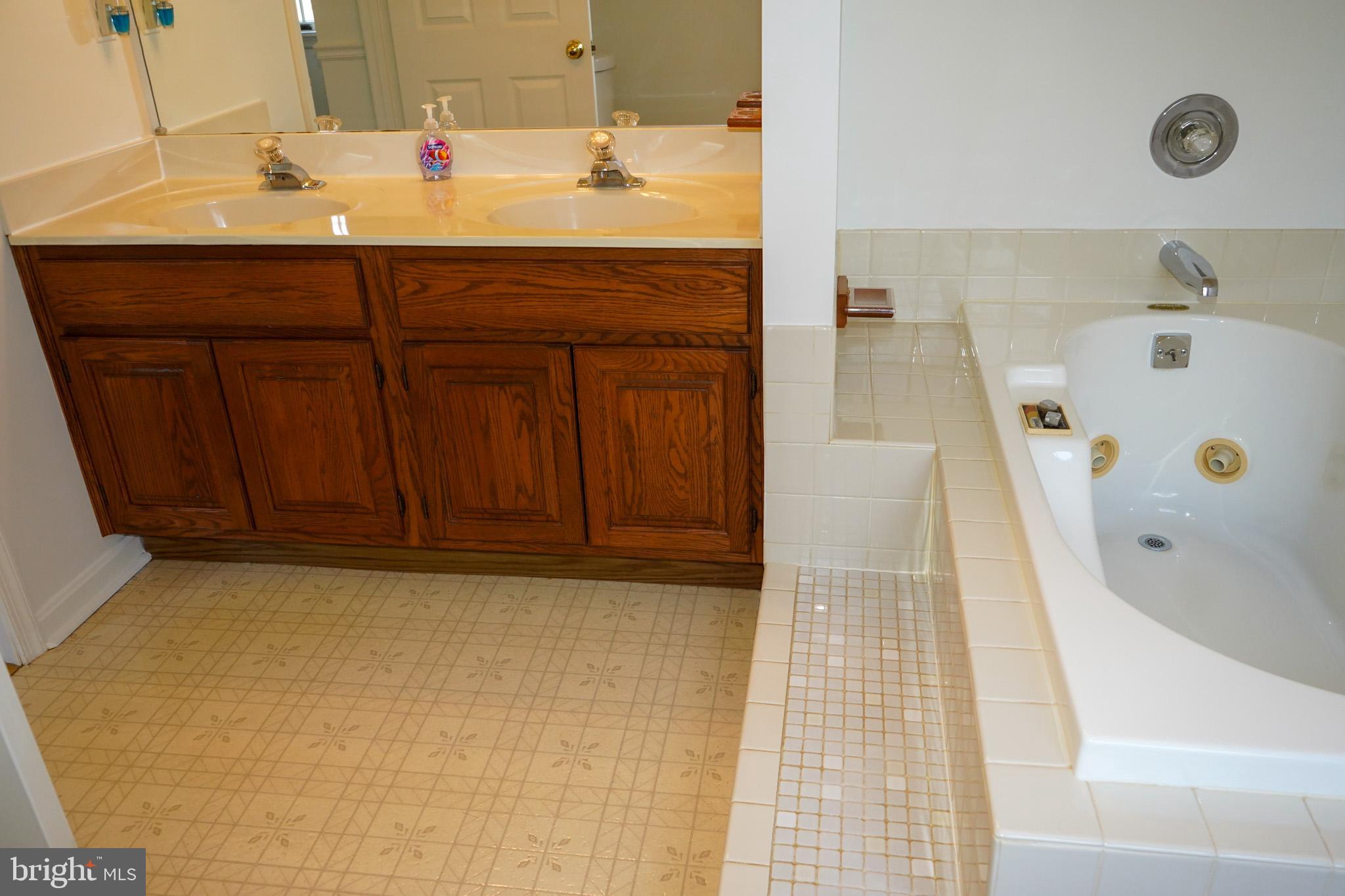 7323 O'Keefe Road Bealeton, VA 22712 - Photo 29 of 48 Spacious bathroom with elegant fixtures.