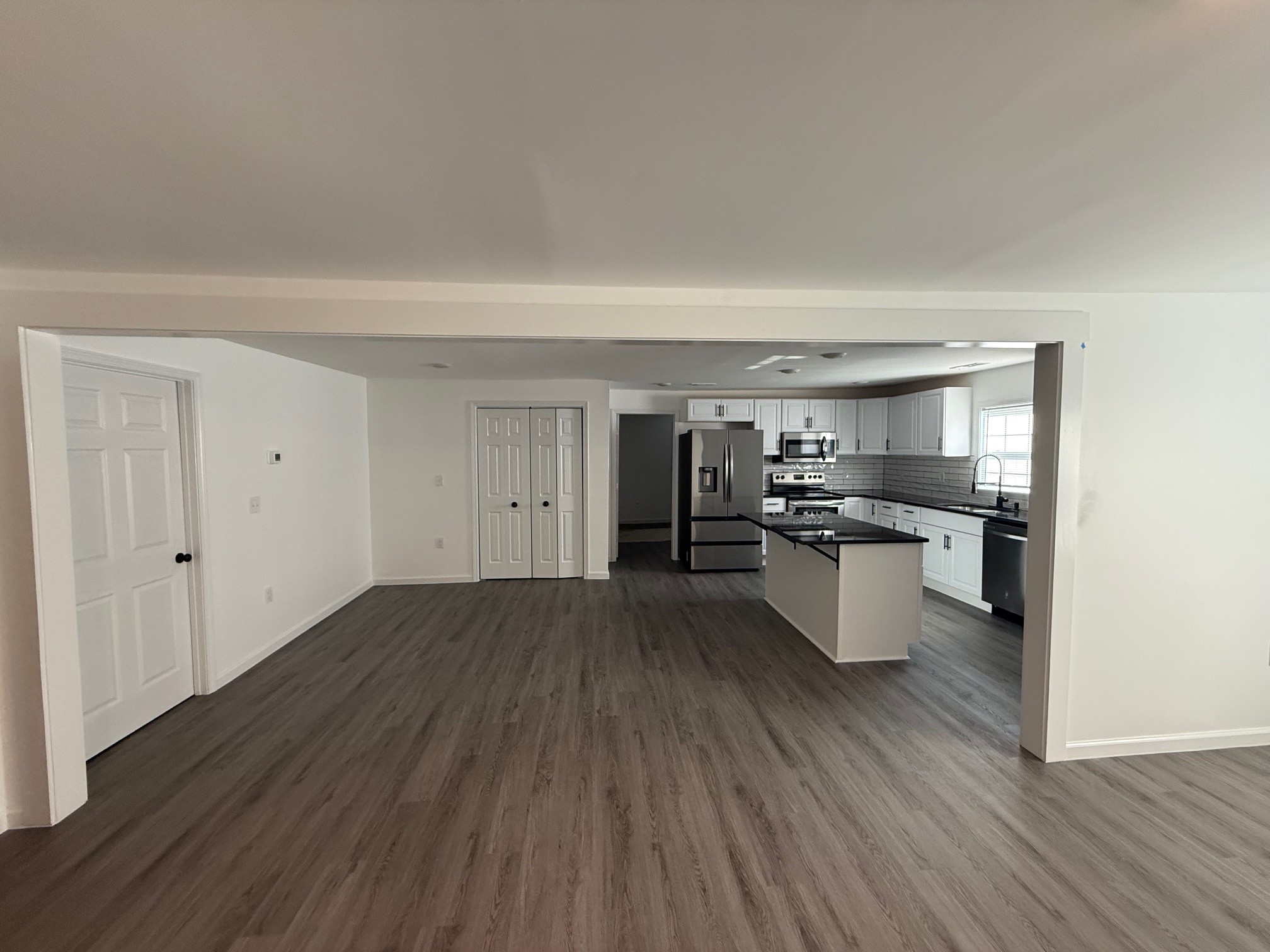 140 Phillips Street Pulaski, TN 38478 - Photo 11 of 32 a kitchen with granite countertop a sink and cabinets