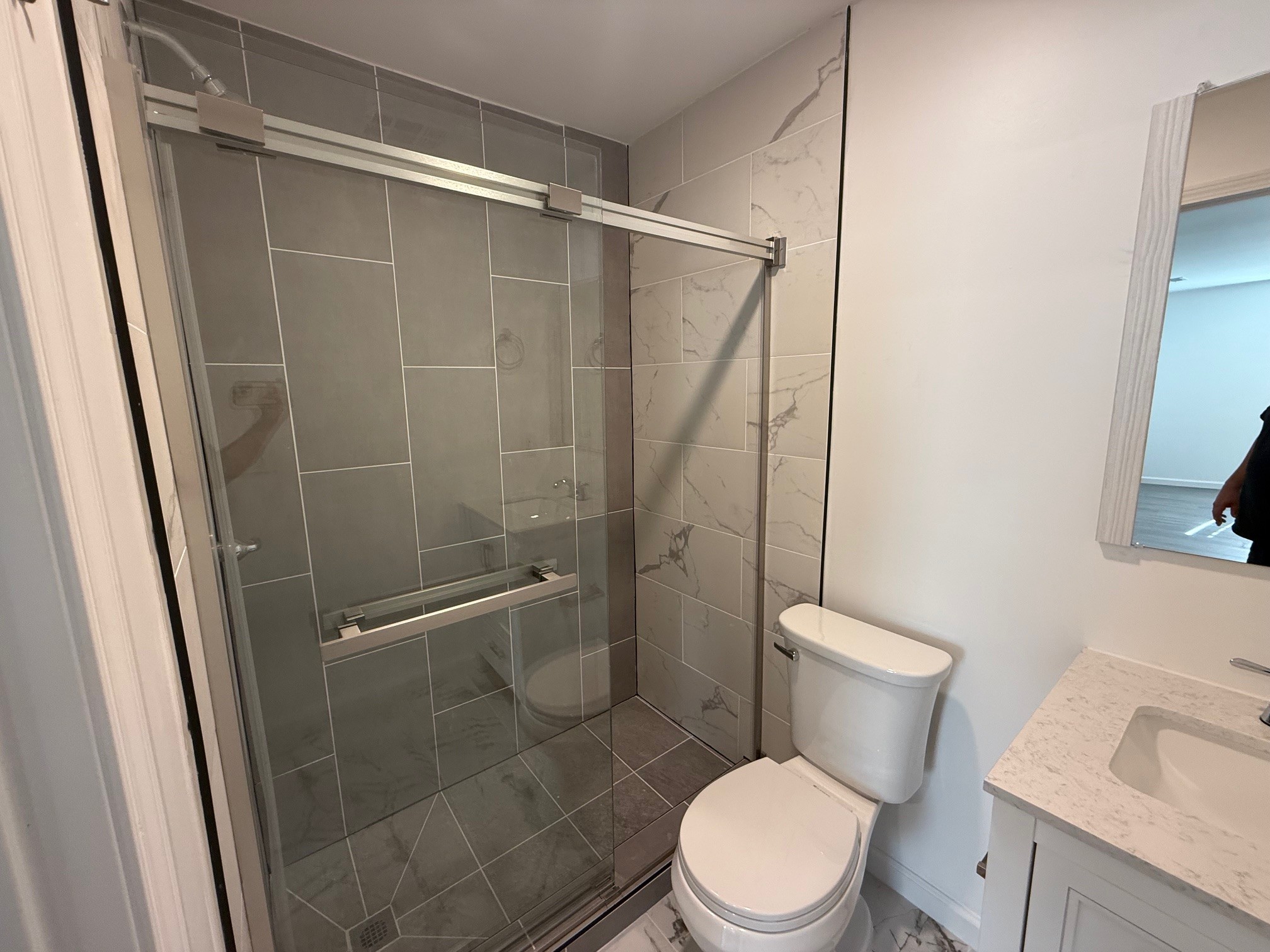 140 Phillips Street Pulaski, TN 38478 - Photo 14 of 32 a white toilet sitting next to a shower