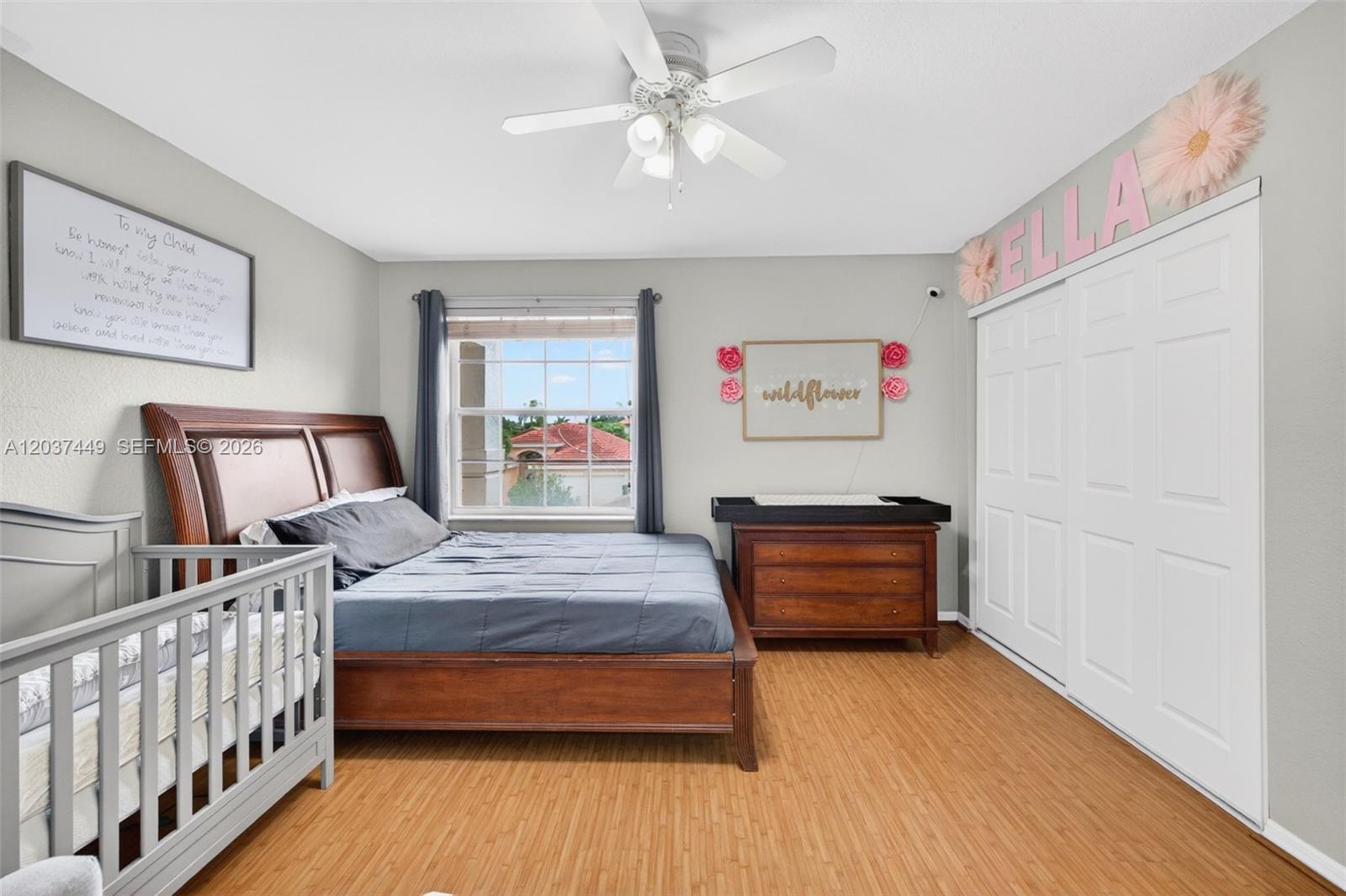 17488 Southwest 28th Court Miramar, FL 33029 - Photo 32 of 50 a bedroom with furniture and a wooden floor