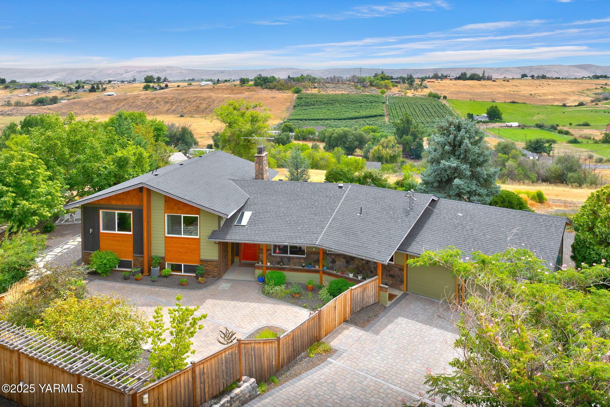 a view of a house with a ocean view
