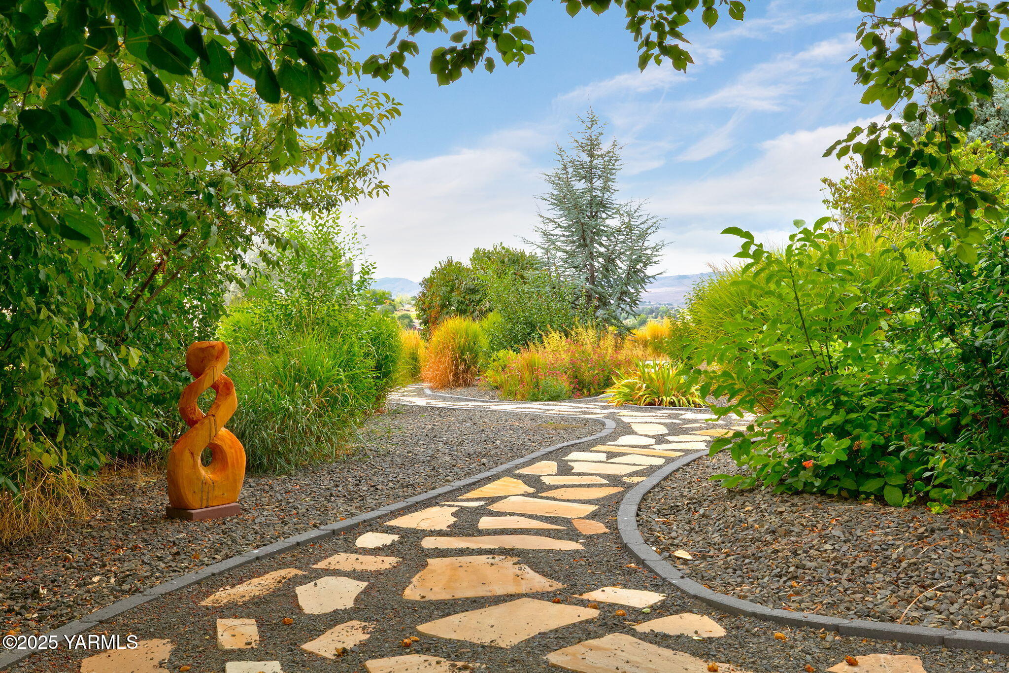 720 Ghormley Road Yakima, WA 98908 - Photo 13 of 47 a view of a backyard with wooden fence