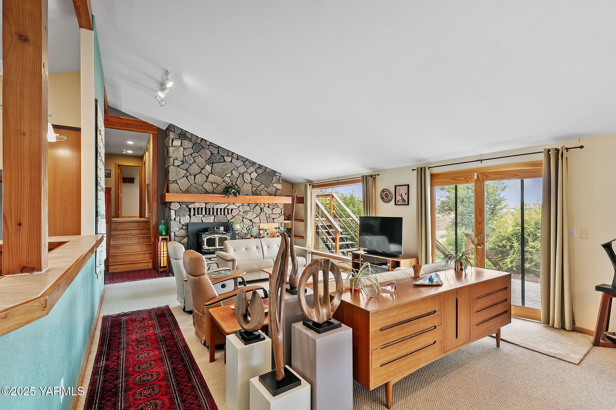 720 Ghormley Road Yakima, WA 98908 - Photo 23 of 47 a view of living room with furniture large window and flat screen tv