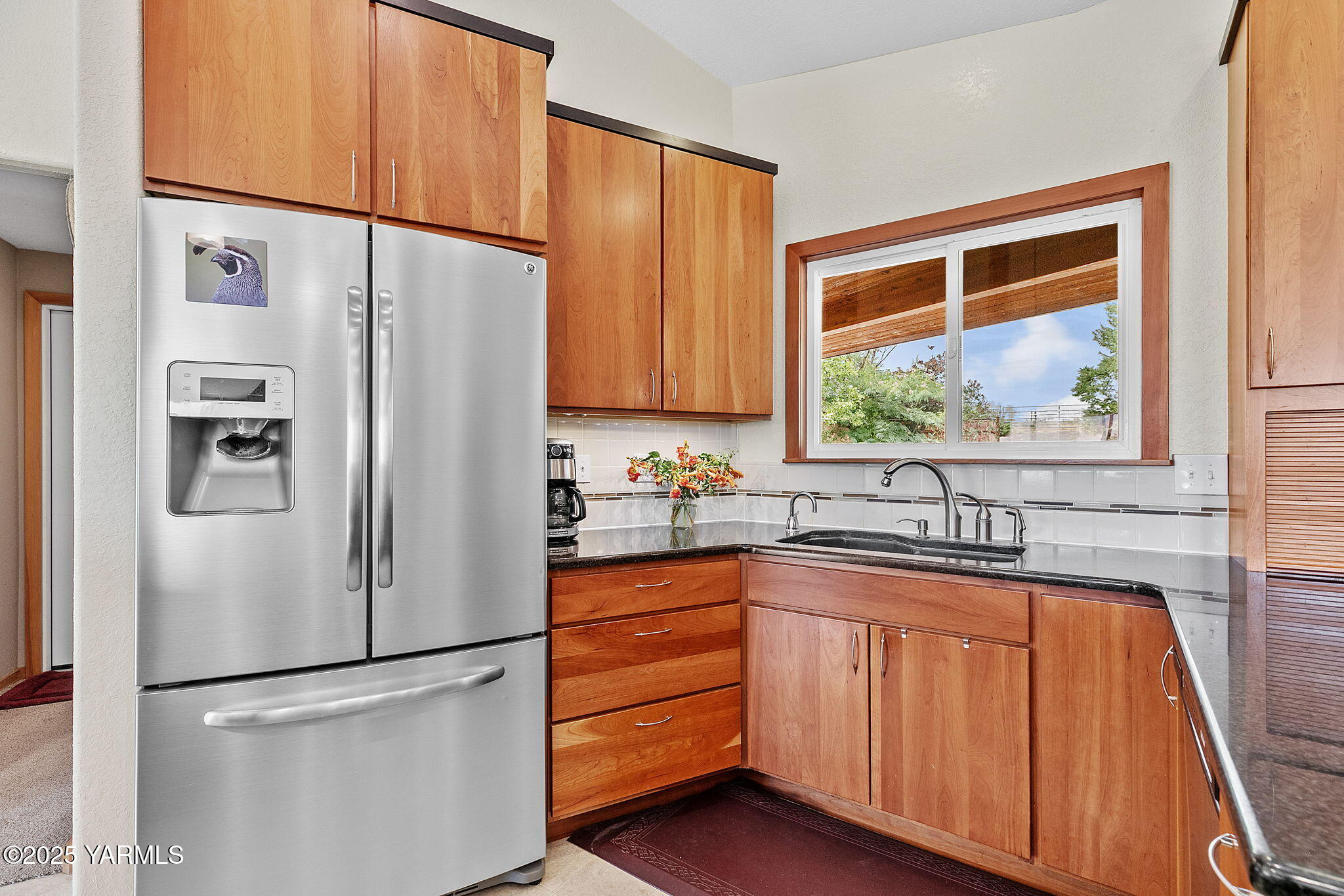720 Ghormley Road Yakima, WA 98908 - Photo 30 of 47 a white refrigerator freezer sitting inside of a kitchen