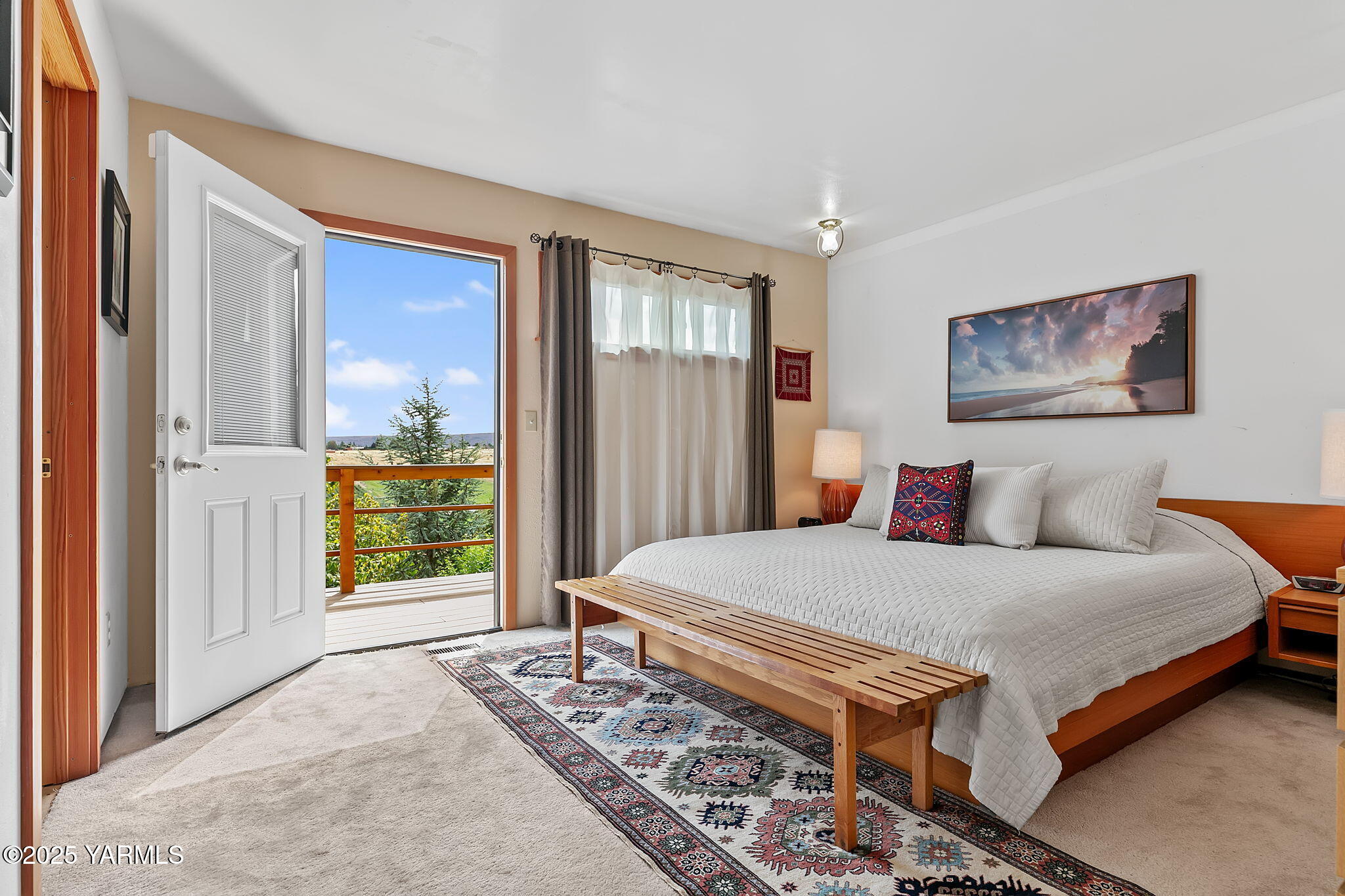 720 Ghormley Road Yakima, WA 98908 - Photo 32 of 47 a bedroom with a bed and a large window
