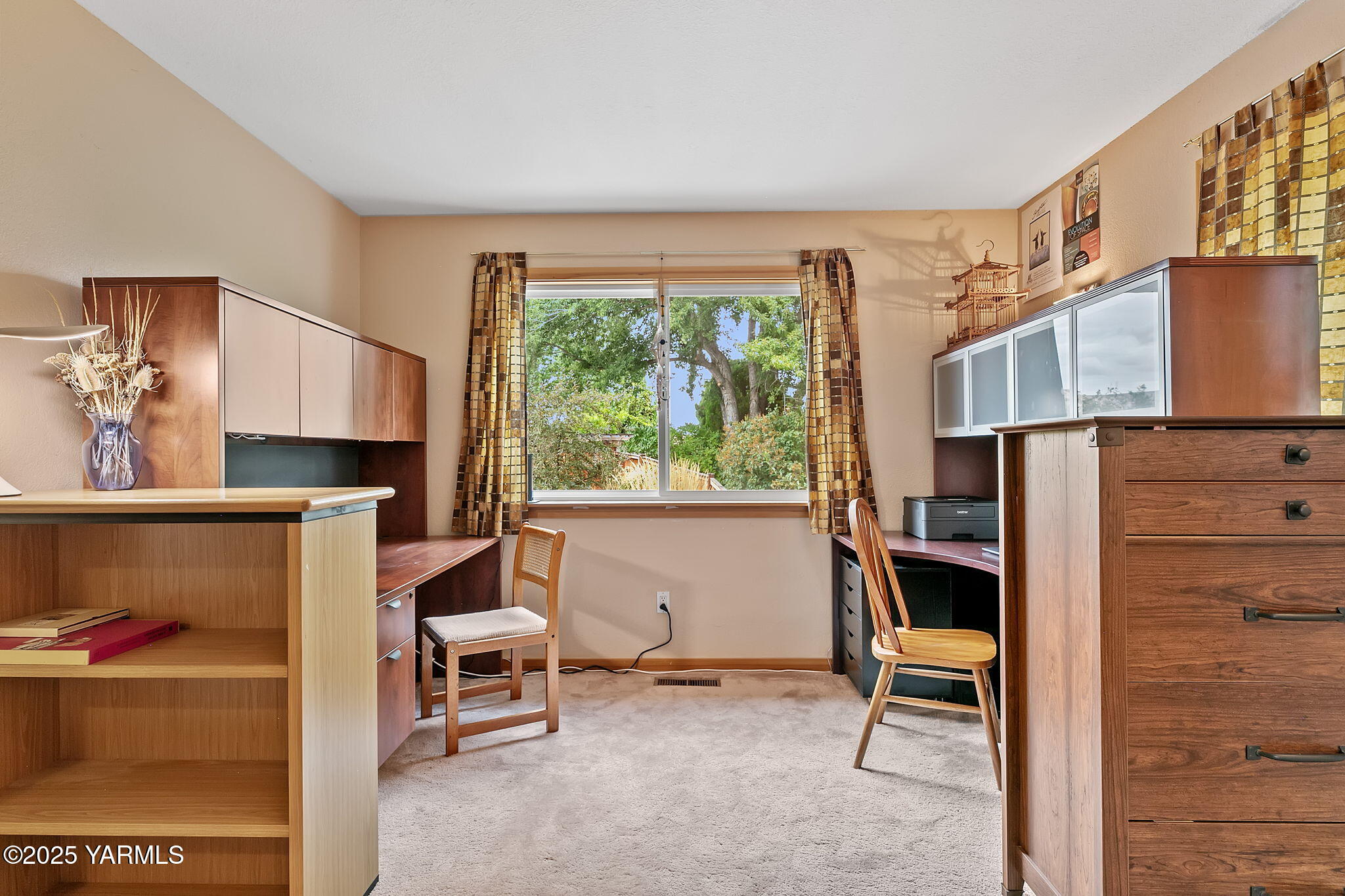 720 Ghormley Road Yakima, WA 98908 - Photo 37 of 47 a living room with furniture a window and a flat screen tv