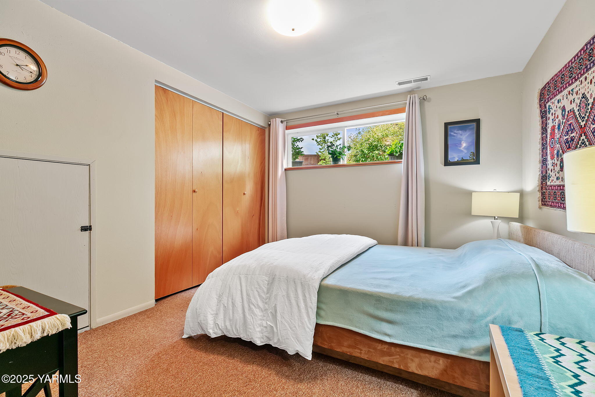 720 Ghormley Road Yakima, WA 98908 - Photo 39 of 47 a bedroom with a bed and a window