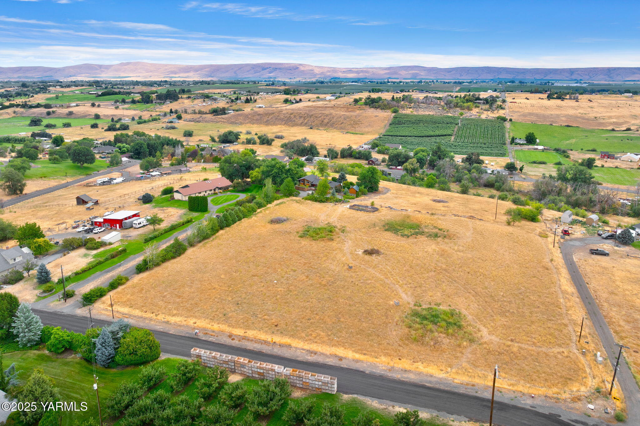 720 Ghormley Road Yakima, WA 98908 - Photo 7 of 47 an aerial view of ocean and residential houses with outdoor space