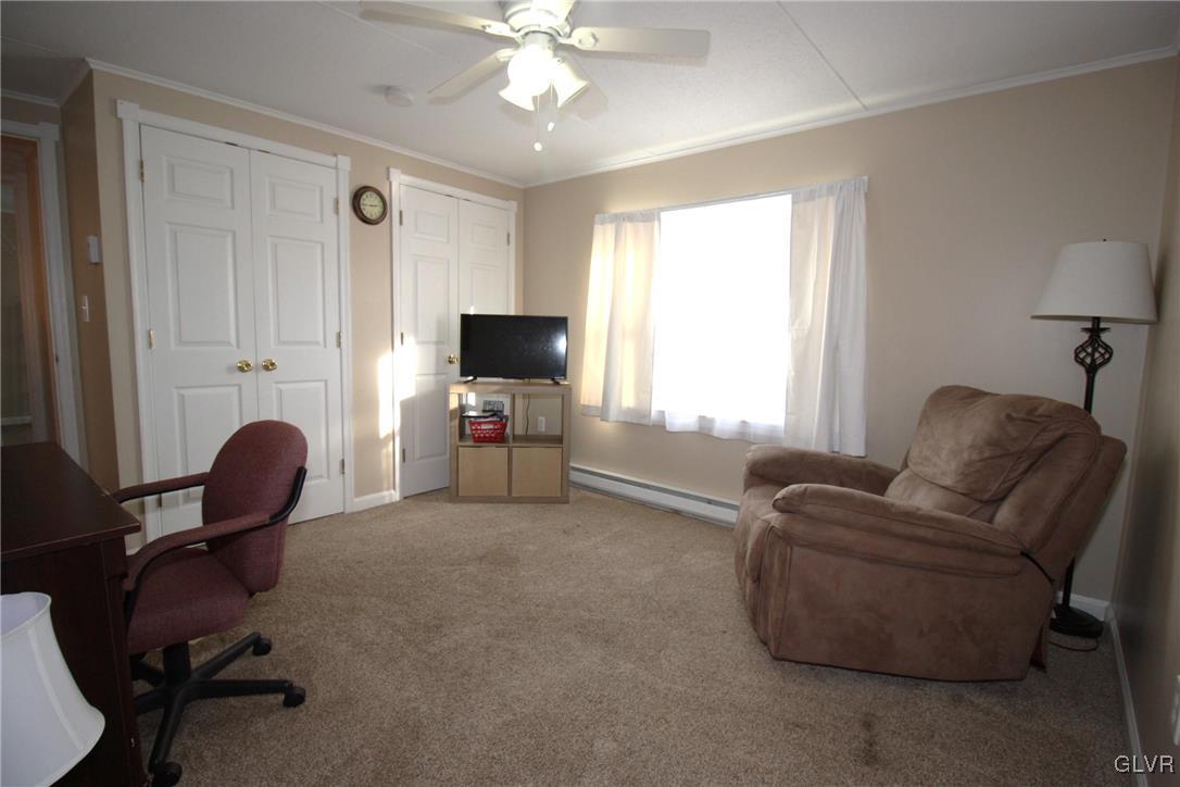 18 Valley View Drive Bath, PA 18014 - Photo 27 of 30 a living room with furniture and a flat screen tv
