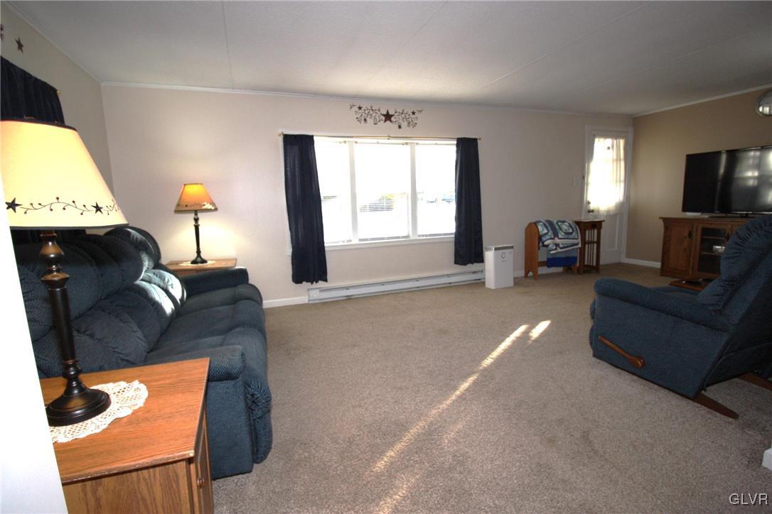 18 Valley View Drive Bath, PA 18014 - Photo 9 of 30 a living room with furniture and a mirror