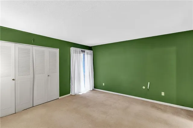 a view of a big room with closet area