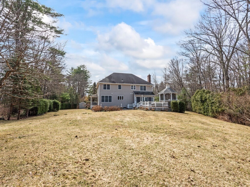 9 Santom Street Auburn, MA 01501 - Photo 39 of 42 a front view of a house with a yard