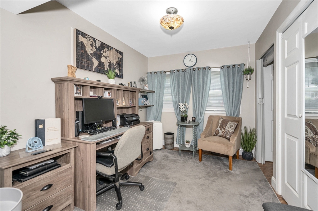 63 Jasper Street Saugus, MA 01906 - Photo 12 of 22 a view of a workspace with furniture and a window