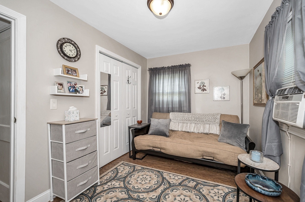 63 Jasper Street Saugus, MA 01906 - Photo 14 of 22 a living room with furniture and a table