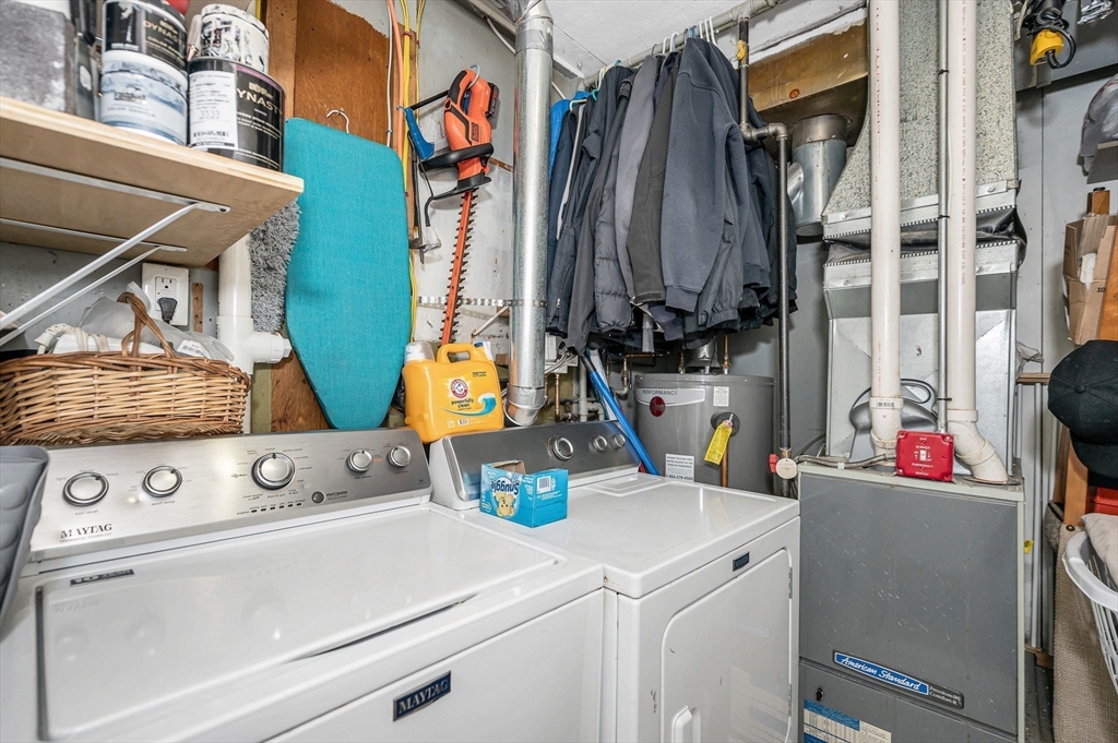 63 Jasper Street Saugus, MA 01906 - Photo 17 of 22 a utility room with dryer and washer