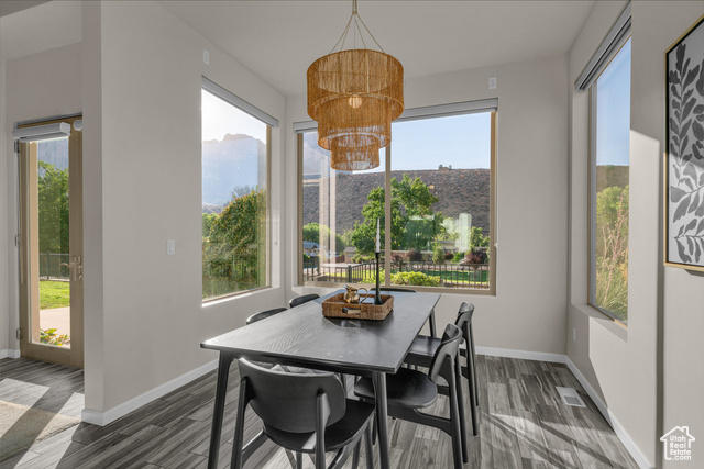 101 Chuckwalla Lane Springdale, UT 84767 - Photo 23 of 51 Dining space with a chandelier, healthy amount of natural light, and a mountain view