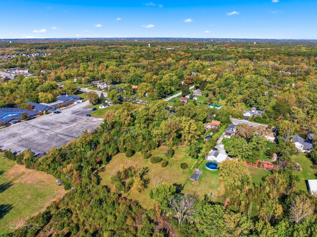 2131 West Exchange Street Crete, IL 60417 - Photo 13 of 14 an aerial view of residential houses with outdoor space and trees
