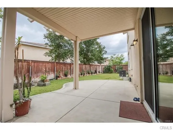 a view of a backyard with a garden