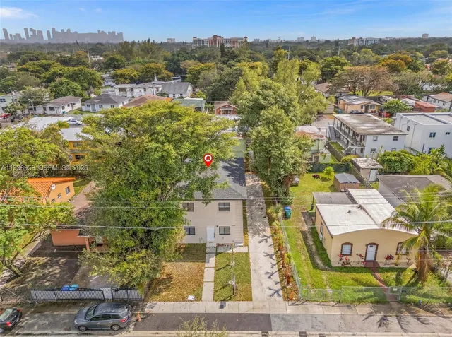 an aerial view of residential building and lake view