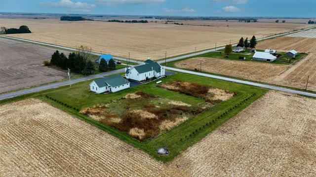 a view of a backyard with wooden floor and a lake view