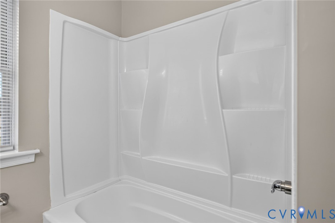 1118 Andros Road Richmond, VA 23225 - Photo 21 of 28 White fiberglass tub and shower combination with i