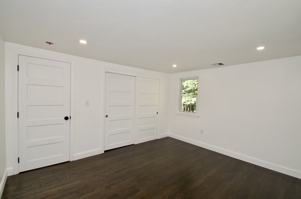 7 Barbara Road Kingston, MA 02364 - Photo 11 of 26 a view of an empty room with wooden floor and closet