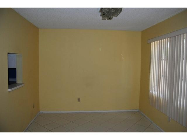 3976 Inverrary Drive, Unit C4 Lauderhill, FL 33319 - Photo 3 of 11 a view of a room with a window