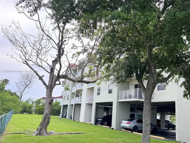 a front view of a building with yard