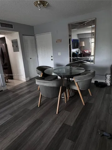 a workspace with wooden floor