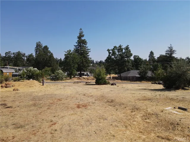 a view of a yard with a snow