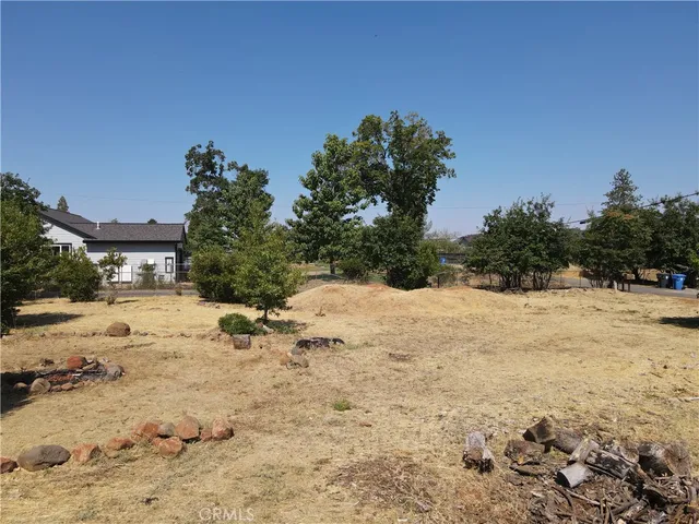 a view of a yard with a snow on the road