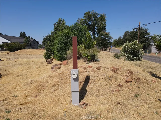 a view of a yard covered with snow