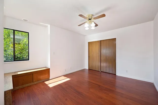 an empty room with large window