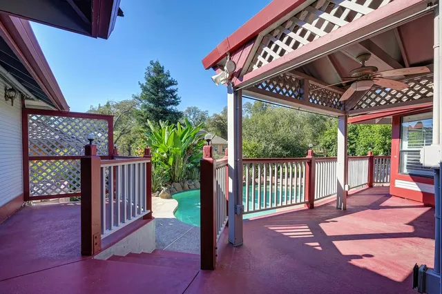 a view of an empty room with a fireplace