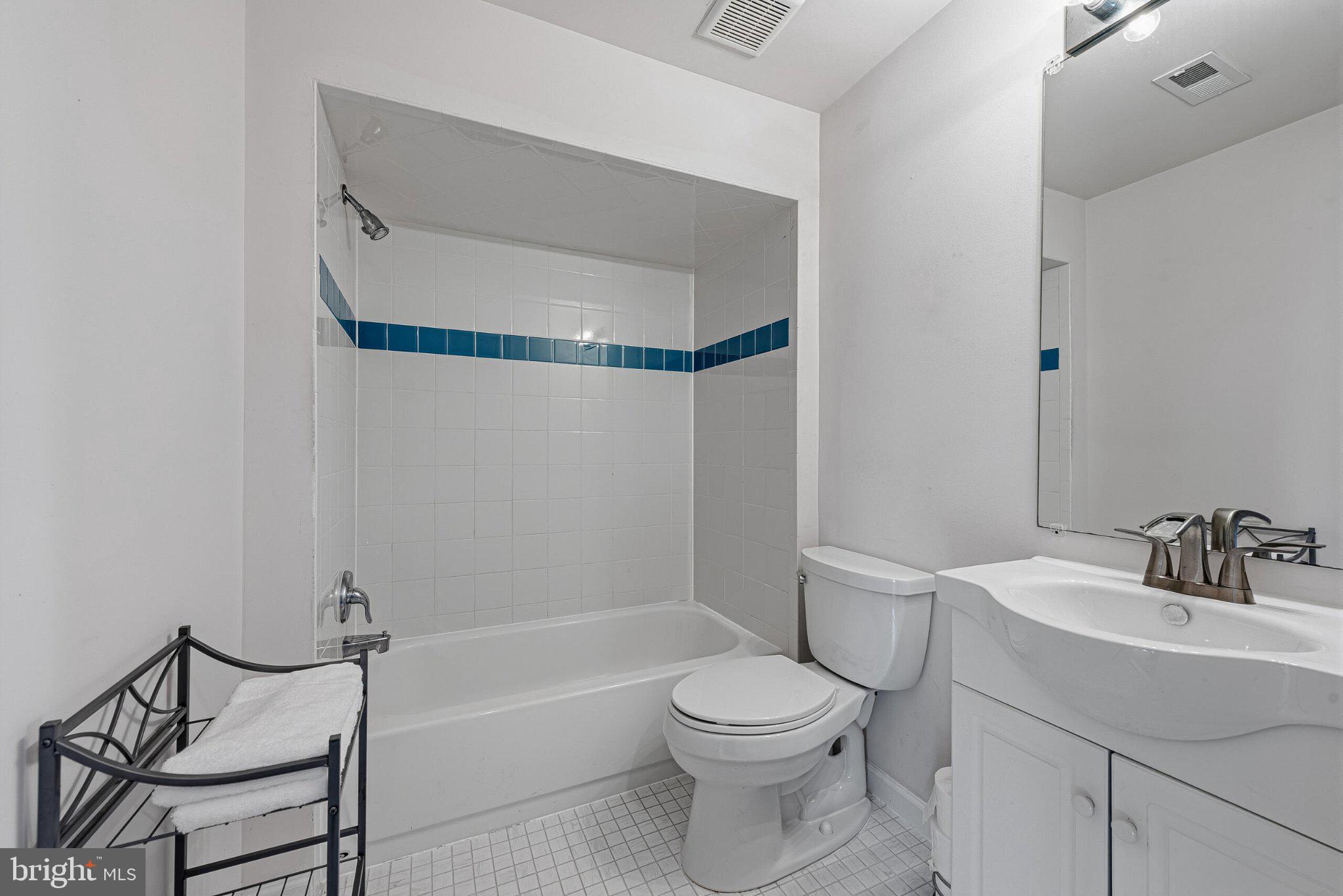 602 Shanks Evans Road Northeast Leesburg, VA 20176 - Photo 38 of 43 Modern bathroom with sleek design.