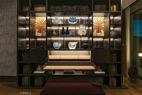 a living room with lots of furniture and a flat screen tv