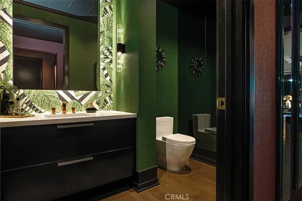 a view of a chairs and table in the balcony