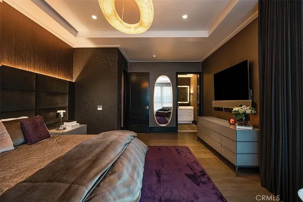 a bathroom with a bathtub sink and mirror