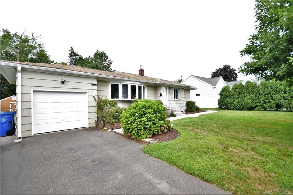 21 Dover Road Newington, CT 06111 - Photo 1 of 1 a view of a house with a yard