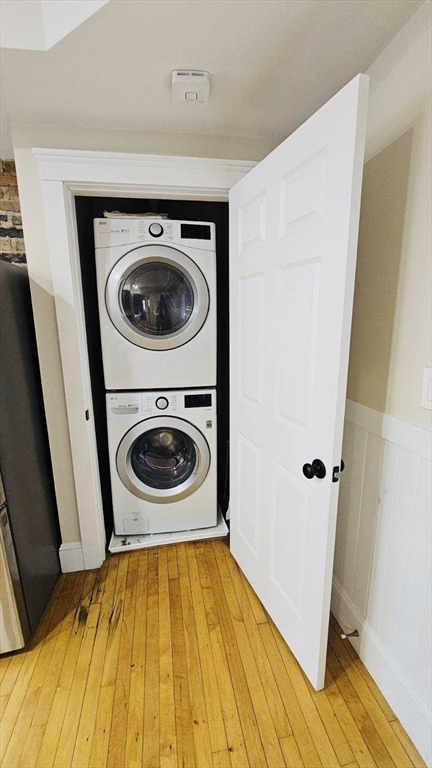 132 North Street, Unit 3 Salem, MA 01970 - Photo 14 of 19 a bedroom with a bed and washing machine