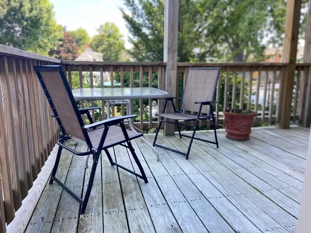 a view of a chairs and table on the terrace