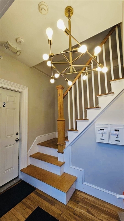 132 North Street, Unit 3 Salem, MA 01970 - Photo 10 of 19 a view of entryway and hall with wooden floor