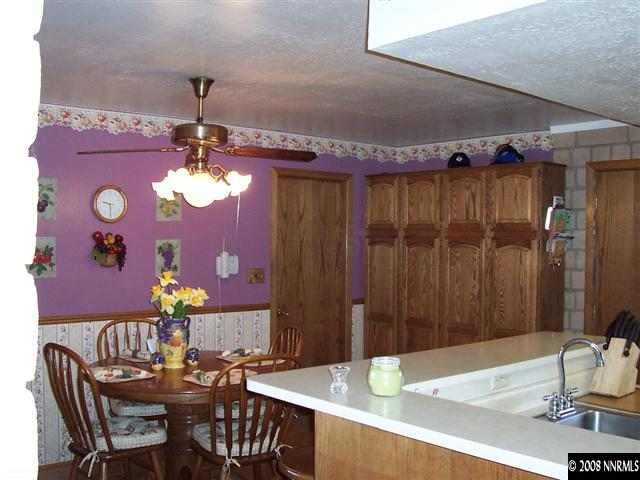 1455 Sioux Trail Reno, NV 89521 - Photo 3 of 9 a dining room with furniture and chandelier