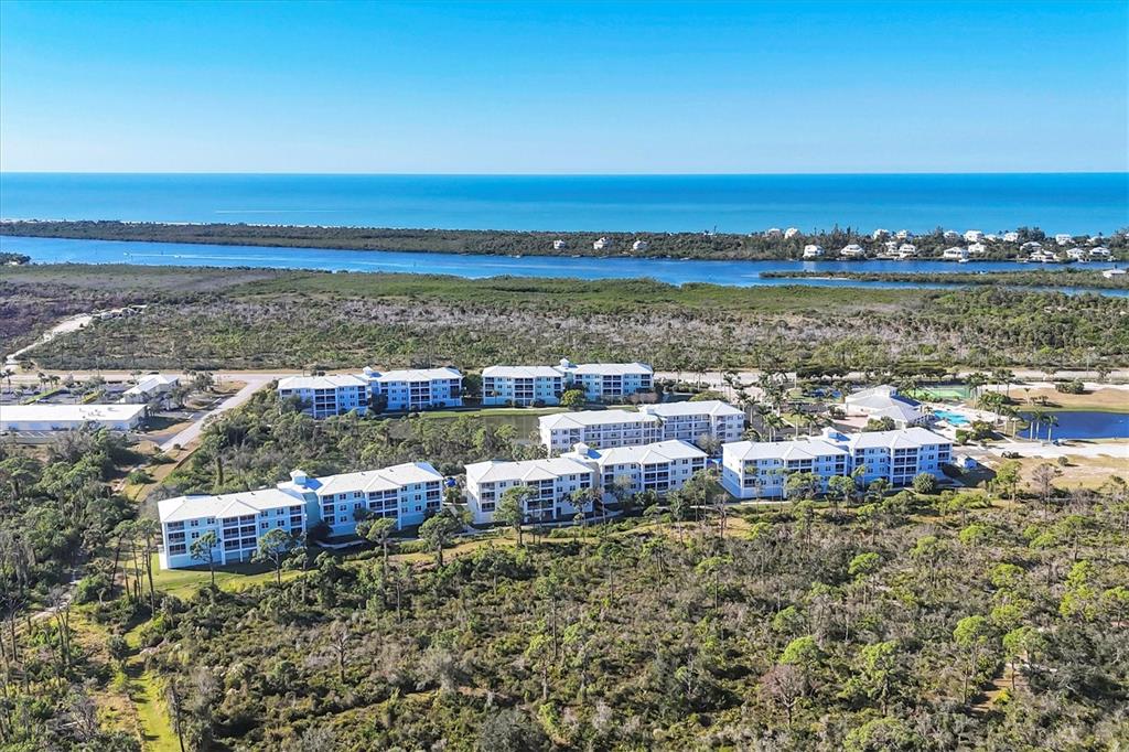 8407 Placida Road, Unit 307 Placida, FL 33946 - Photo 2 of 50 a view of a city and ocean view